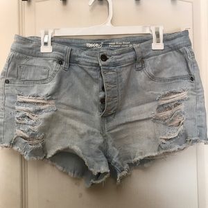 Light blue denim shorts with lace pockets